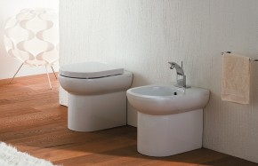 Vaso e Bidet a terra serie Skip